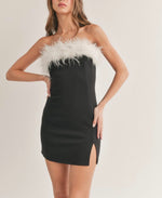 Black mini tube dress with white feather trim