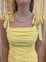 Alaia yellow shoulder tie ruched mini dress