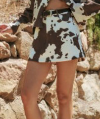 🐄 2️⃣ Cow Print Mini Skirt