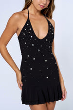 Black halter neck open back mini dress with embellishment