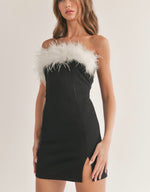 Black mini tube dress with white feather trim