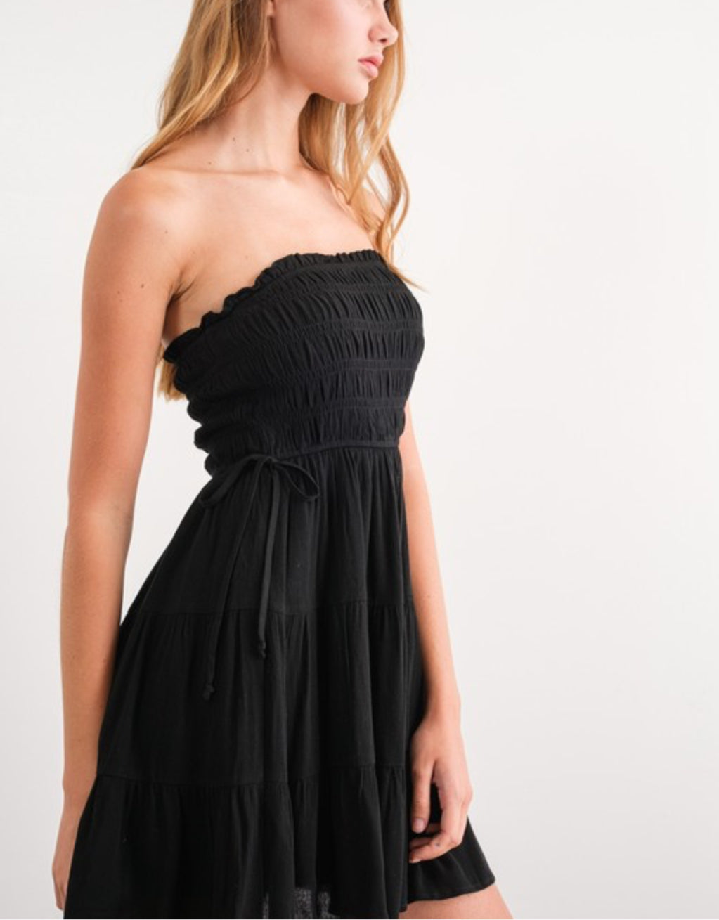 Black Strapless smocked torso tiered Mini Dress S / Black / Strapless Mini Dress Black Strapless smocked torso tiered Mini Dress S / Black / Strapless Mini Dress