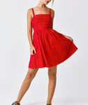 Red ruched empire waist mini dress with spaghetti straps