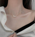 Pearl and dainty necklaces
